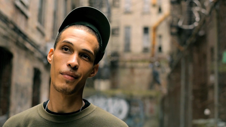 Elvis de Leon being filmed on streets of Harlem, NY