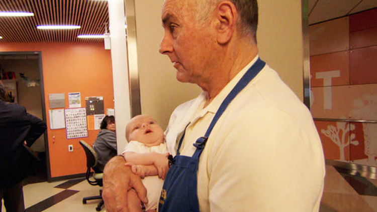 Teacher Holding Baby