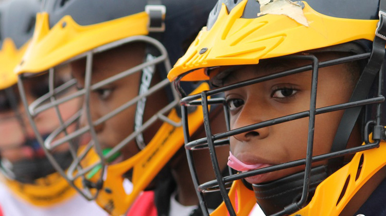 Children in lacrosse outfit