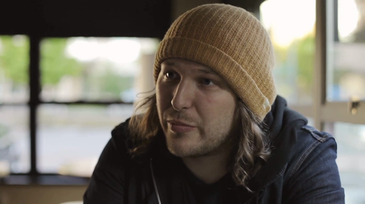 Tanner looking into camera in interview