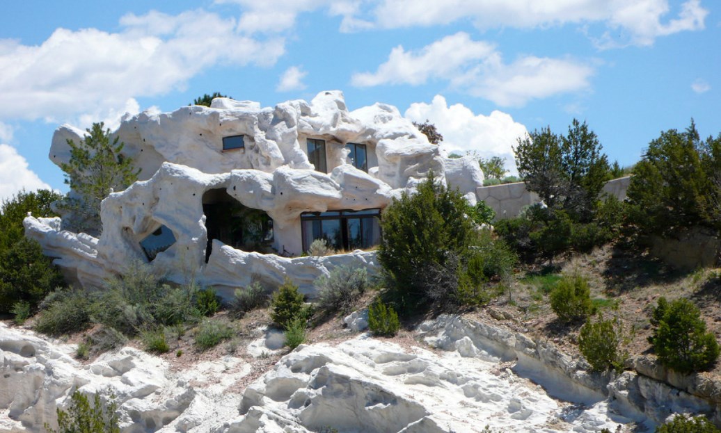 New Mexico home that is camouflaged in with nature, adobe structure