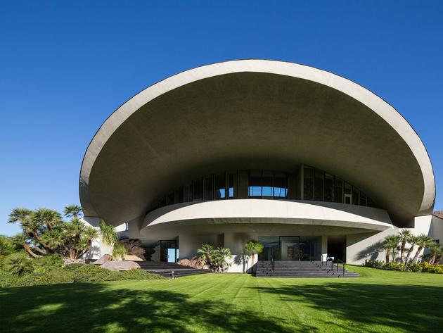 Home with a ledge to give it shade, dome home