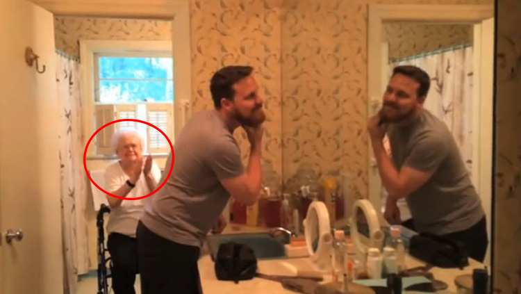 Grandson shaving while grandma claps hysterically
