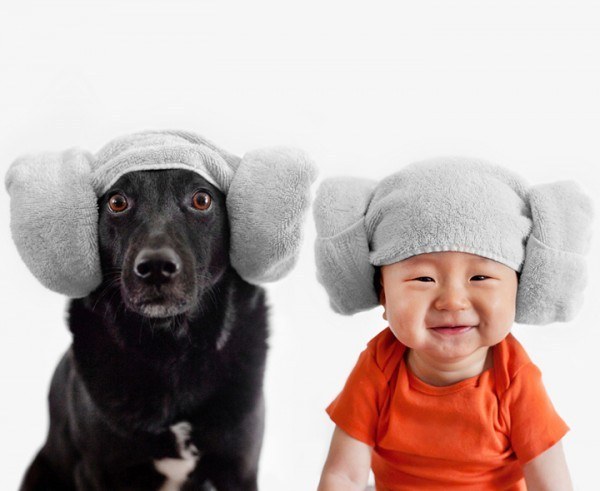 dog and baby wearing towel hats