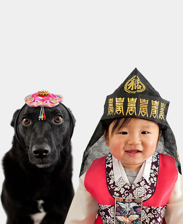 dog and cowboy dressed in a traditional eastern asia fashion