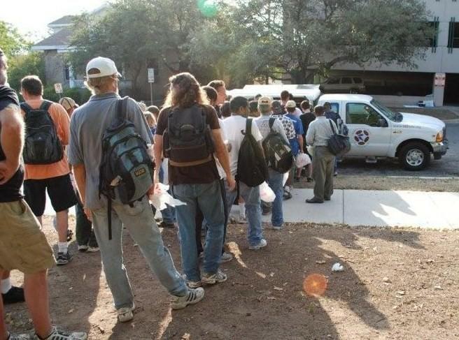mobile loaves and fishes food truck feeding meals to homeless and hungry