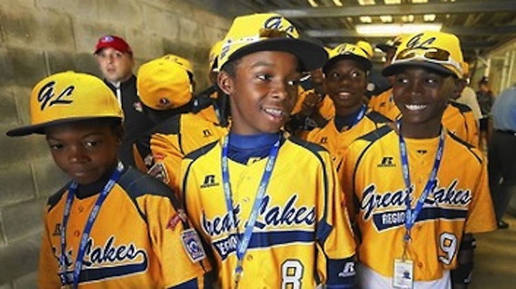 Jackie Robinson West players and umpires, waiting before the start of the Little League World Series opening at in Williamsport Pennsylvania, on Thursday, Aug. 14, 2014.