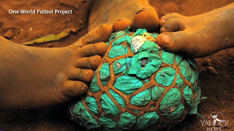 Trash soccer ball with kids feet