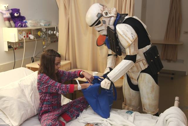 scott loxley visiting kids at hospital in sandtrooper costume