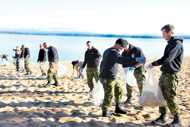 soldiers cleaning up beach