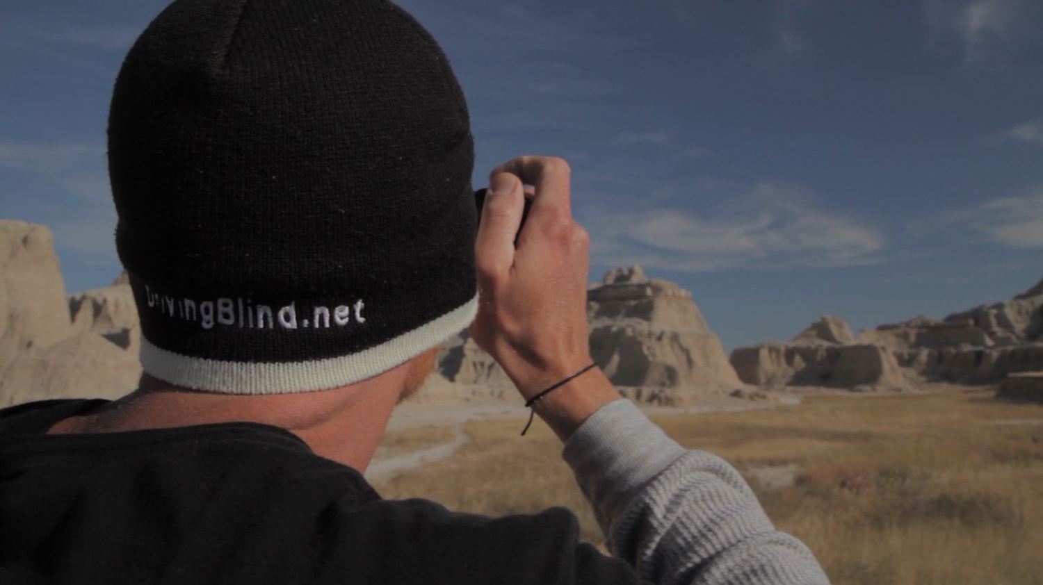 tod taking picture of mountains
