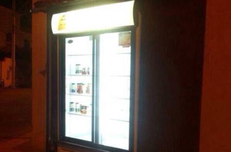 man puts fridge outside of home to feed the needy