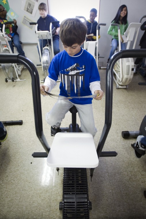ward student reading and riding