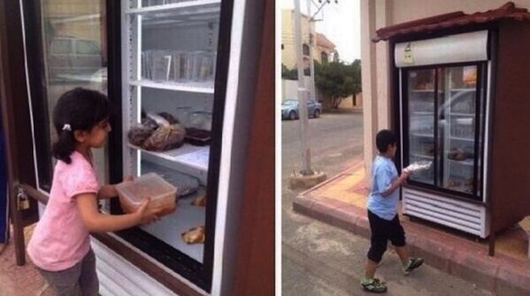 man sets up fridge outside to feed the hungry