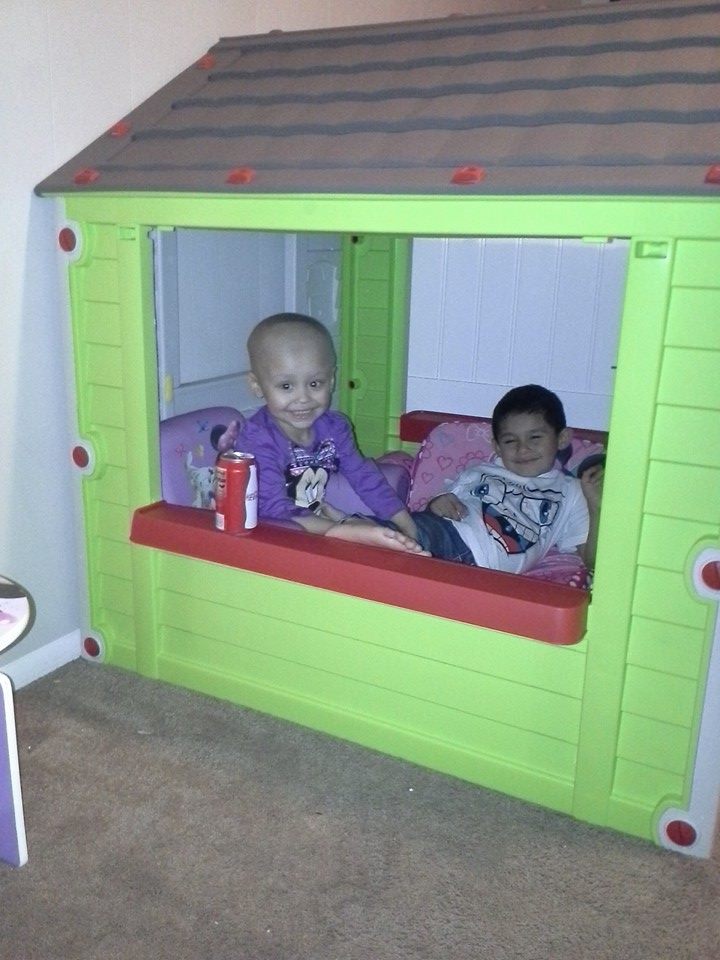 zadee and brother in her new playhouse