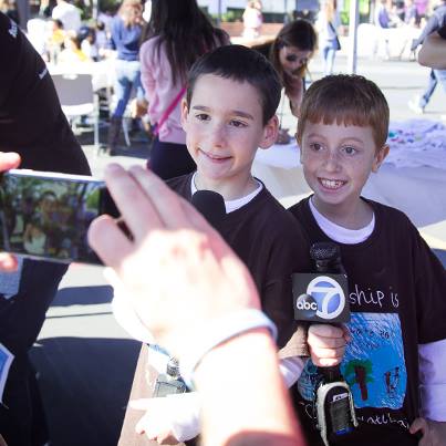 dylan and jonah talk to news reporters