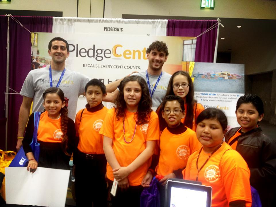 pledgecents team with students 
