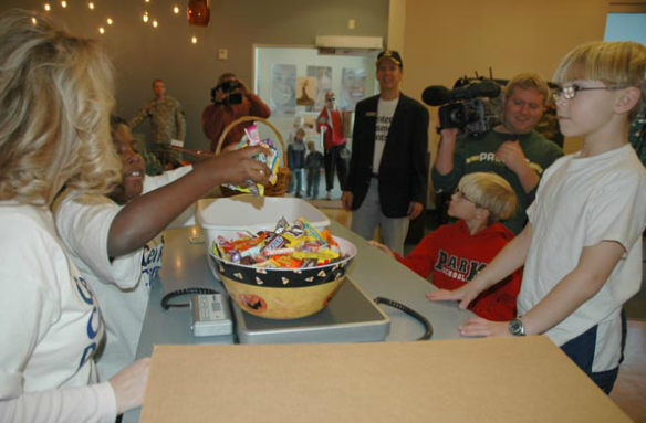 kids turn in candy for buyback program