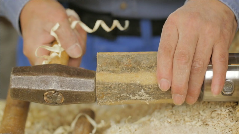 Mr. Okazaki securing wood block to the lathe