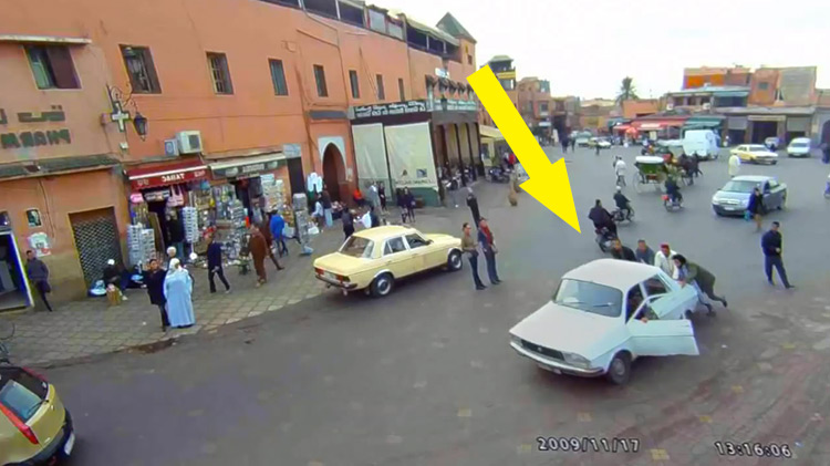 People caught on hidden camera pushing stalled car