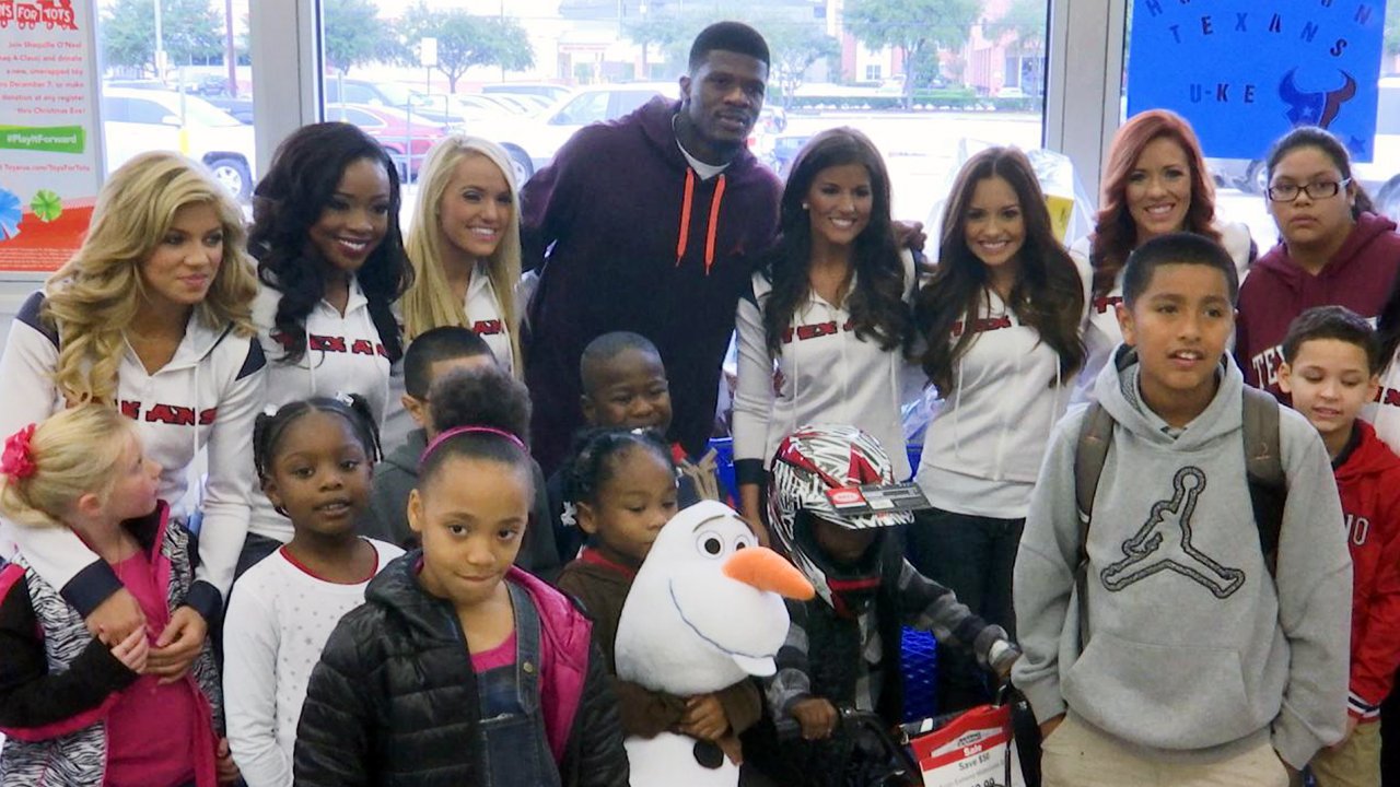 andre johnson with underprivileged kids