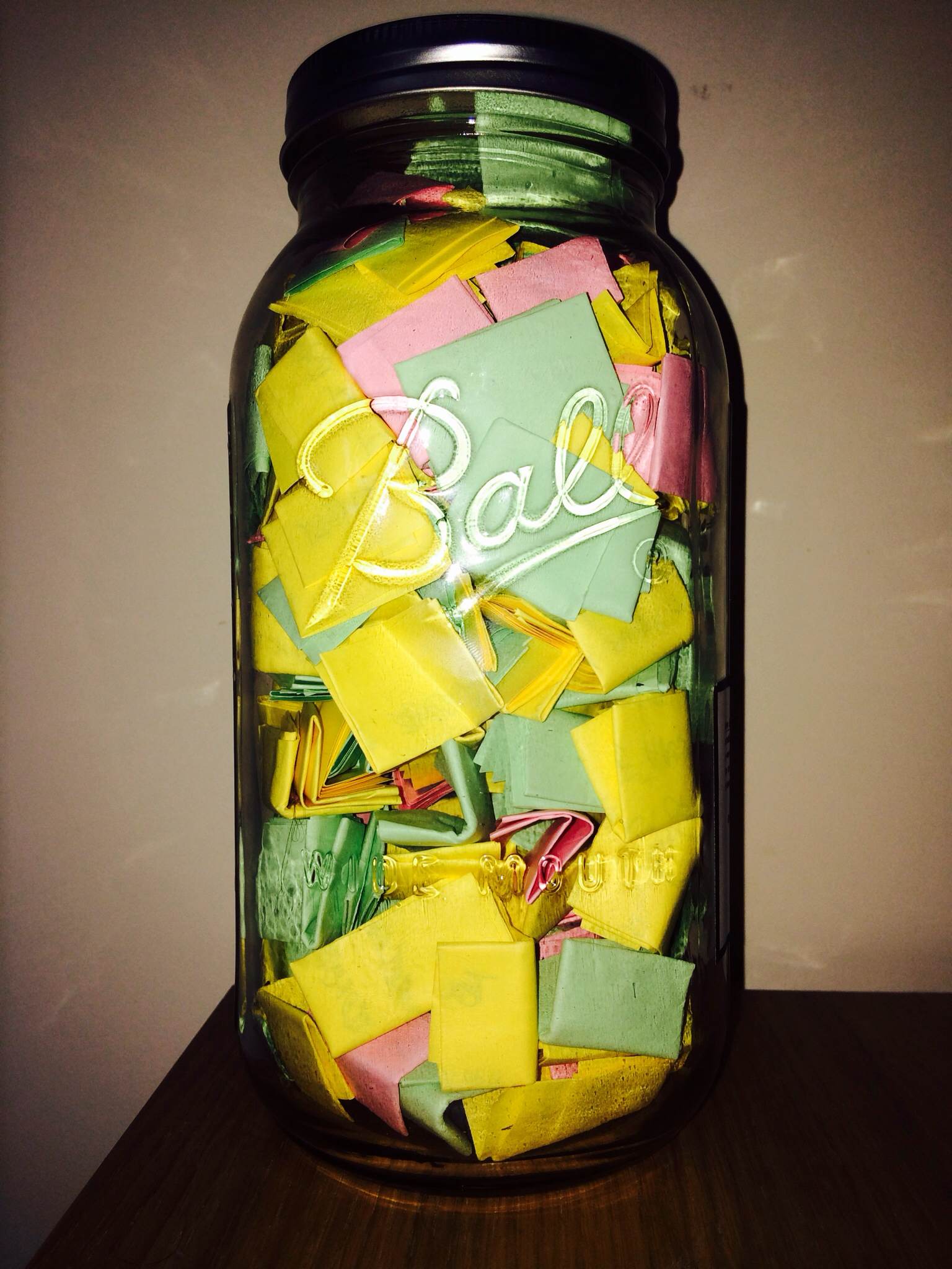 ball mason jar full of notes