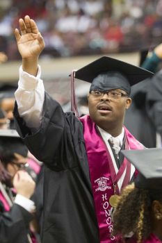 ezra roy at college graduation