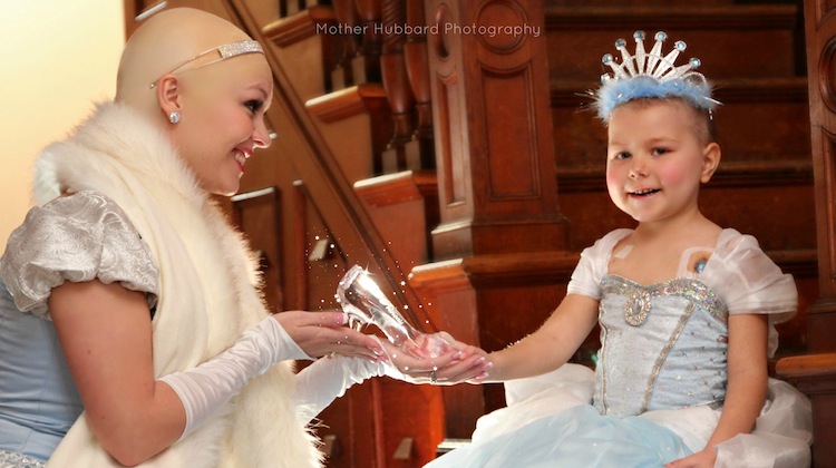 little girl poses with bald cinderella