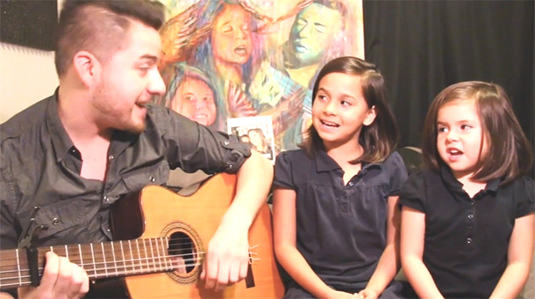 Jorge Narveaz And Daughters Sing "Home"