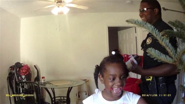 girl surprised by christmas decorations