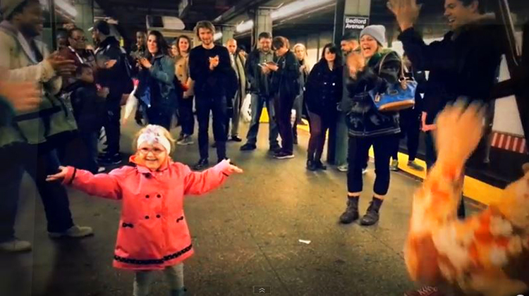 girl dancing in middle of nyc subway