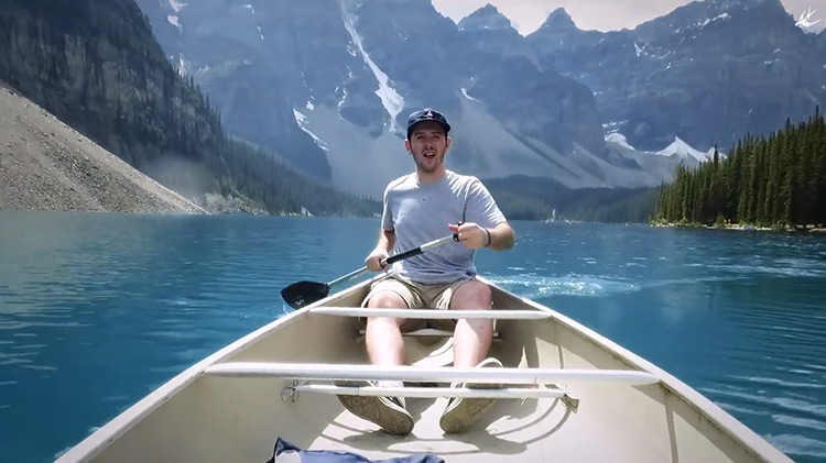 Guy in canoe in Canada