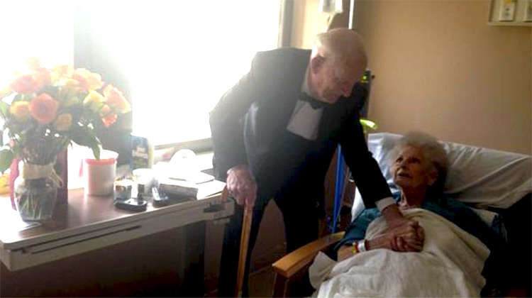 Jim Russell in tuxedo surprising wife Elinor on 57th anniversary