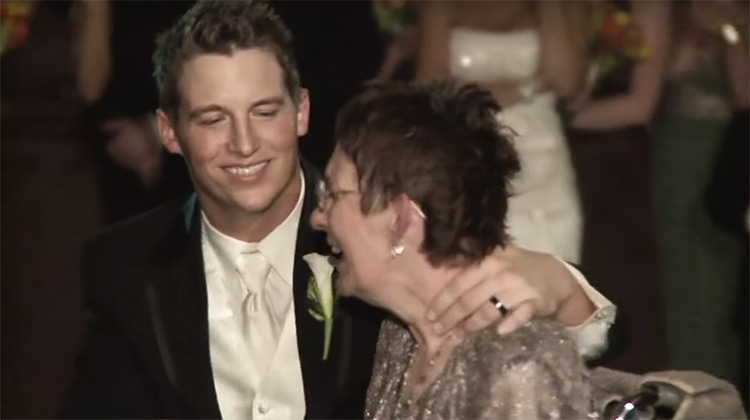 Son dancing with sick mom at wedding