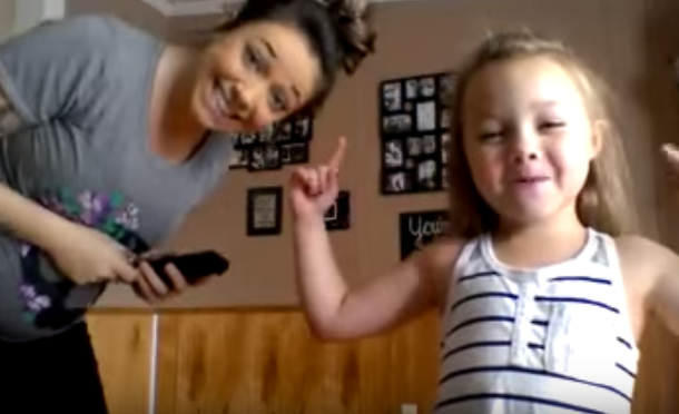 Girl and mom dancing