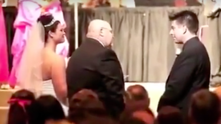 Dad handing over daughter at wedding