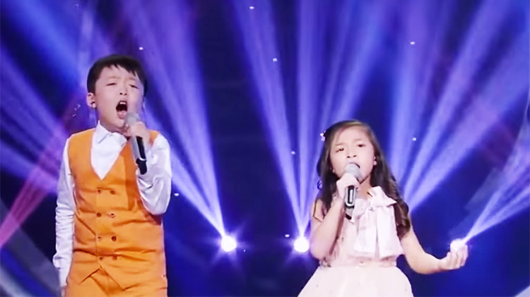 Chinese kids singing You Raise Me Up