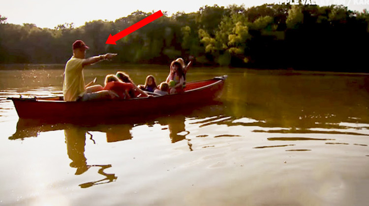 Turtle Man with neighborhood kids in canoe