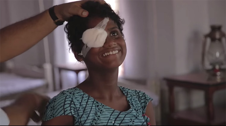 Blind girl with bandage on eye