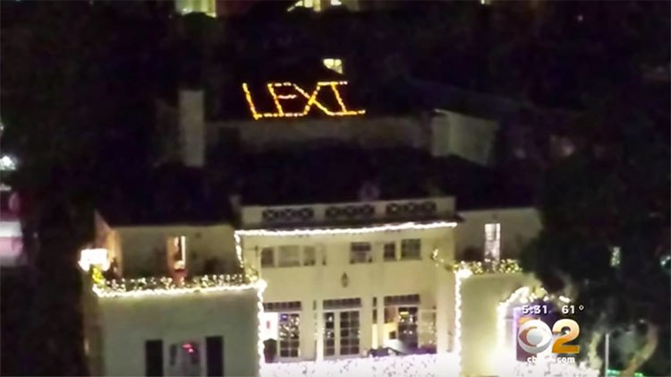 Lexi written in lights on SAE house