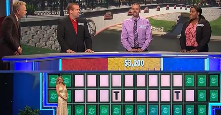 Pat Sajak looks over at a contestant on "Wheel of Fortune" with a confused look after she guessed an unusual letter.
