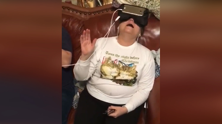 mom with vr goggles and christmas sweater