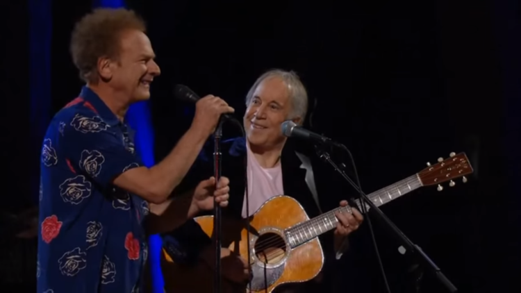 Simon & Garfunkel perform "Sound of Silence" during the Rock and Roll Hall of Fame 25th Anniversary, which was held in 2009 at New York's Madison Square Gardens.