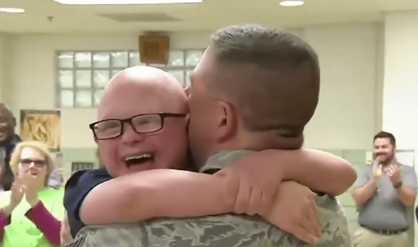 Down syndrome son with soldier dad