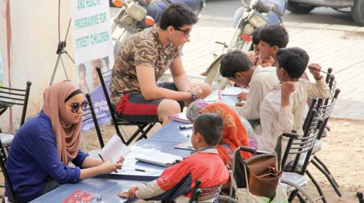 Teens at street school in Pakistan