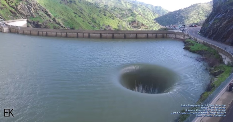 aerial side view of the glory hole in lake berryessa.