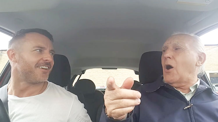 dad sings duet with son in car