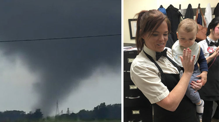 waitress holds baby during tornado