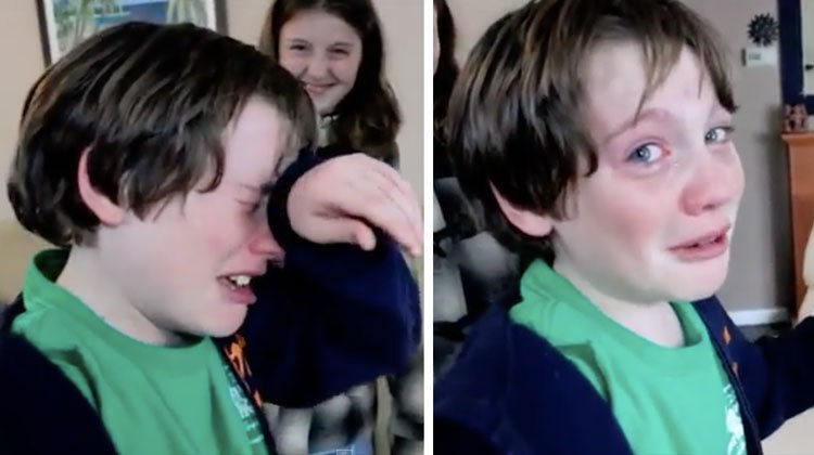 boy crying when he sees cat again