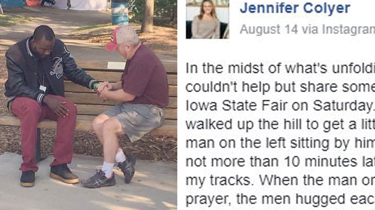 black man and white man praying together